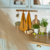 The amber yellow tea towels made of natural linen are durable, making them the ideal companions for your daily culinary adventures. Carefully and precisely crafted, our linen tea towels are not only practical but also add colour and sophistication to your kitchen.