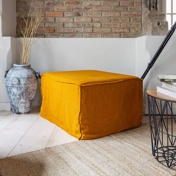 Our new amber yellow linen ottoman cover – the ultimate solution for giving your ottoman a fresh look and upgrading your interior. Refresh your living space with our linen ottoman cover today and experience the effortless elegance.