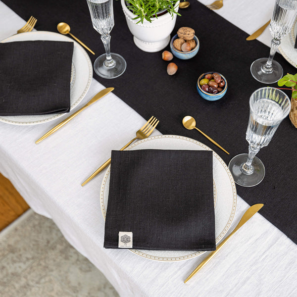 Introducing our black linen napkins set, designed to elevate your dining experience with a touch of warmth and charm. Crafted with care, these napkins are the perfect companions for your culinary adventures.