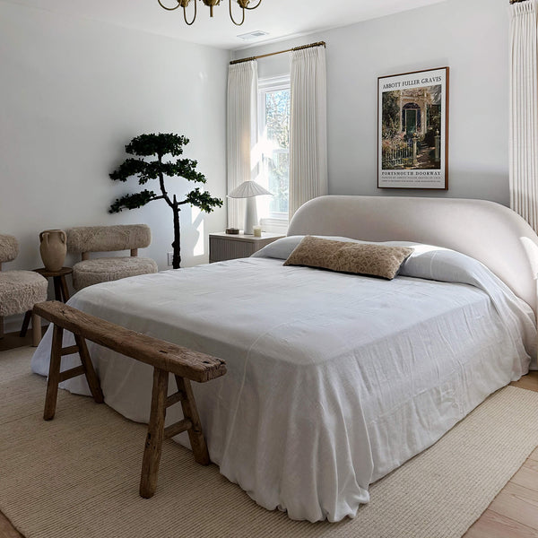 Bright white linen bedspread designed to infuse your bed with an extra touch of uniqueness, coziness and charm. Draped elegantly over your bed as a bedspread or wrapped snugly around you on chilly nights, it's versatile enough to suit your needs.