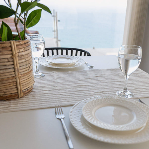 Crafted with care, this runner adds a touch of distinction and sophistication to any dining experience. The subtle yet refined design lends versatility, making it suitable for both casual gatherings and formal occasions.