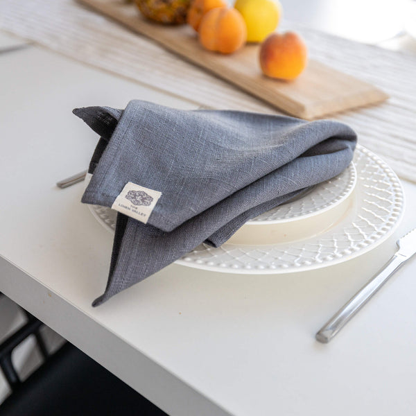 Introducing our charcoal grey linen napkins set, designed to elevate your dining experience with a touch of warmth and charm. Crafted with care, these napkins are the perfect companions for your culinary adventures.