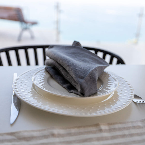 Introducing our charcoal grey linen napkins set, designed to elevate your dining experience with a touch of warmth and charm. Crafted with care, these napkins are the perfect companions for your culinary adventures.