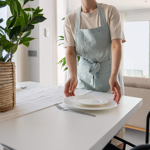 Whether you're a seasoned chef or an aspiring home cook, our linen aprons are sure to elevate your culinary experience. Explore our diverse range of styles and discover the apron that complements your personal taste and kitchen decor.