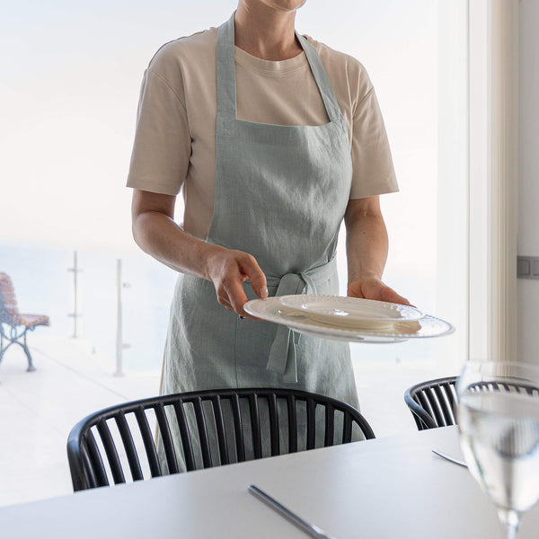 Whether you're a seasoned chef or an aspiring home cook, our linen aprons are sure to elevate your culinary experience. Explore our diverse range of styles and discover the apron that complements your personal taste and kitchen decor.