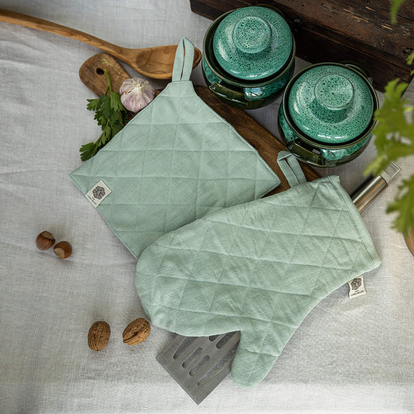Crafted with care, these duck egg blue linen oven mitten sets are the perfect companions for your culinary adventures.