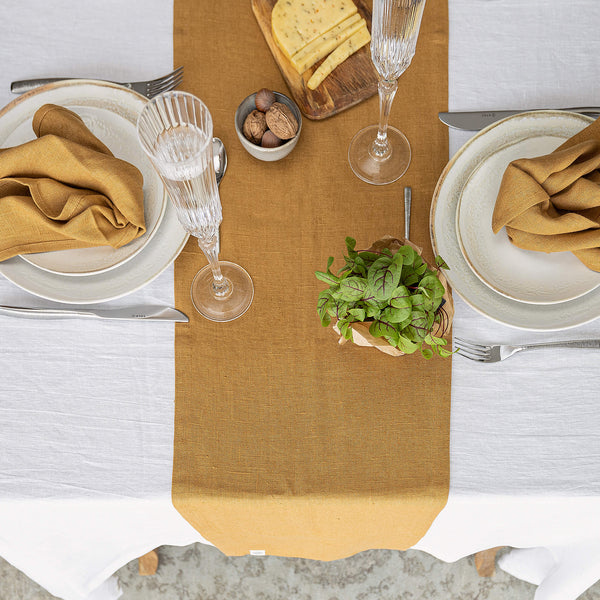 Give your table a touch of distinction and decoration with our dusty mustard linen table runner. Use the table runner on its own or combine it with a linen tablecloth, placemats or napkins.