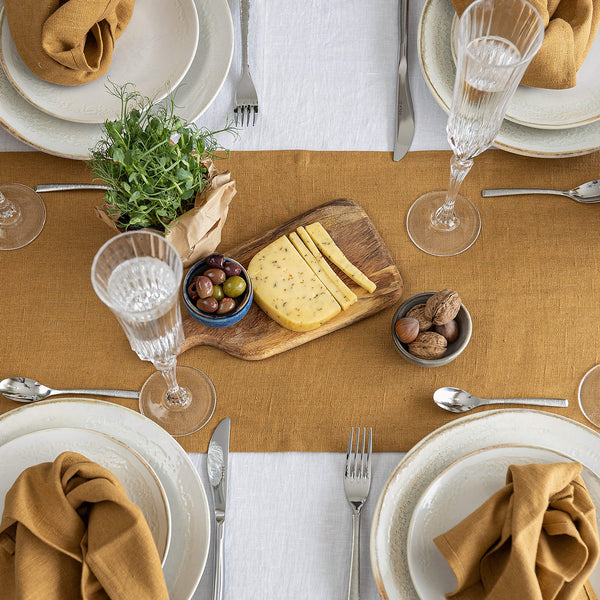 Give your table a touch of distinction and decoration with our dusty mustard linen table runner. Use the table runner on its own or combine it with a linen tablecloth, placemats or napkins.