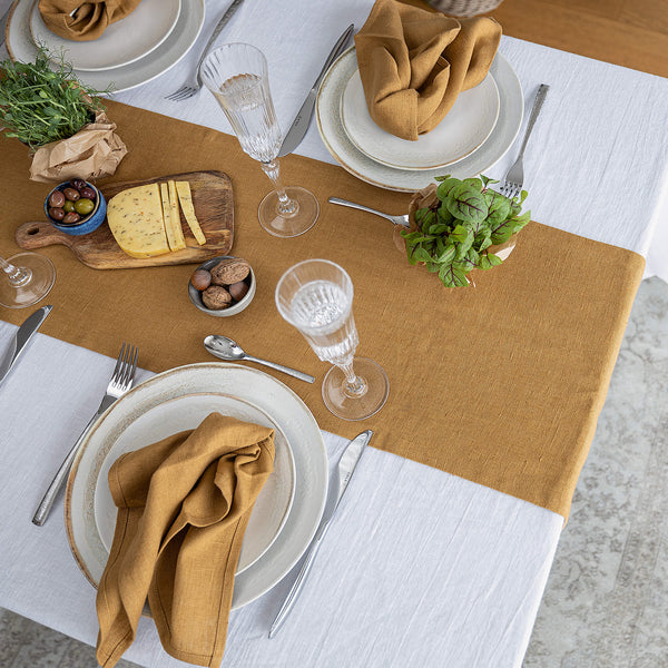 Give your table a touch of distinction and decoration with our dusty mustard linen table runner. Use the table runner on its own or combine it with a linen tablecloth, placemats or napkins.