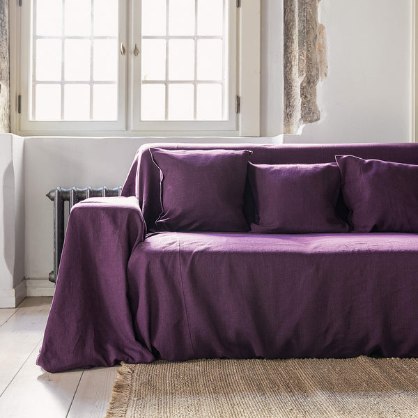 Choosing deep purple colour for your couch cover not only offers protection but also brings a timeless elegance to your home interior.