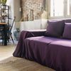 Choosing deep purple colour for your couch cover not only offers protection but also brings a timeless elegance to your home interior.