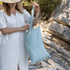 Duck egg blue linen canvas bags designed and made for long, comfortable and sustainable use. Whether you're going to the beach, planning a visit to the organic market, or taking your baked cake to friends, our linen bag is always perfect for you.