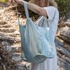 Duck egg blue linen tote bags designed and made for long, comfortable and sustainable use. Whether you're going to the beach, planning a visit to the market, or taking your baked cake to friends, our linen bag is always perfect for you.