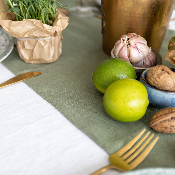 Give your table a touch of distinction and decoration with our moss green linen table runner. Use the table runner on its own or combine it with a linen tablecloth, placemats or napkins.