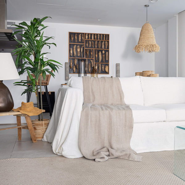 Rustic heavy linen waffle throw crafted from a cozy waffle weave, blanket adds a layer of warmth and style to any bedroom decor.