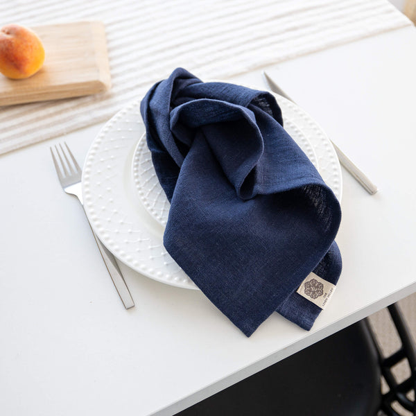 Introducing our navy blue linen napkins set, designed to elevate your dining experience with a touch of warmth and charm. Crafted with care, these napkins are the perfect companions for your culinary adventures.