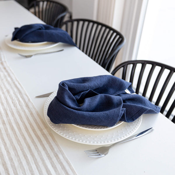 Introducing our navy blue linen napkins set, designed to elevate your dining experience with a touch of warmth and charm. Crafted with care, these napkins are the perfect companions for your culinary adventures.