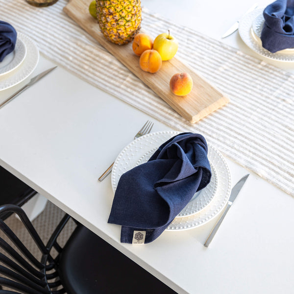 Introducing our navy blue linen napkins set, designed to elevate your dining experience with a touch of warmth and charm. Crafted with care, these napkins are the perfect companions for your culinary adventures.