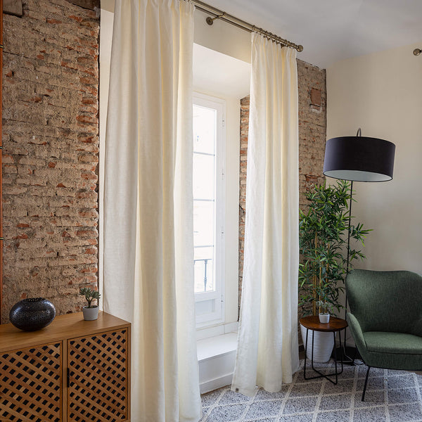Lined off white linen curtain with lining, designed and made to provide maximum protection from the sun and heat coming through the window. Natural thermoregulatory properties of linen will help you to create comfortable atmosphere at home.
