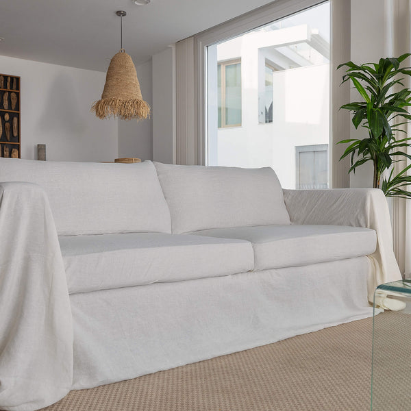 Renew your space effortlessly with our off white linen couch covers—where style meets functionality for a truly enchanting home transformation. Our covers extend gracefully over the arms of your sofa, providing a seamless fit and a polished look.