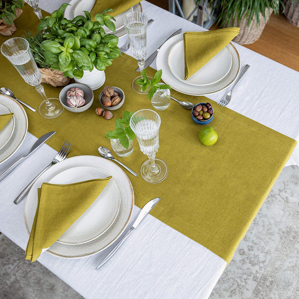 Give your table a touch of distinction and decoration with our olive green linen table runner. Use the table runner on its own or combine it with a linen tablecloth, placemats or napkins.