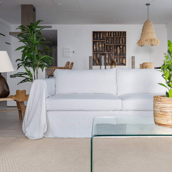 Refresh your living space with our optical white linen couch cover, designed to breathe new life into your sofa and elevate your home decor. Offering full coverage, including over the arms, it effortlessly safeguards your couch from everyday wear.