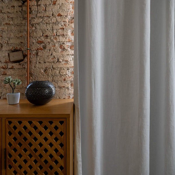 Blackout optical white linen curtains provide complete privacy and maximum protection from sunlight and artificial light sources. Our blackout linen curtains are ideal for bedroom, living room or any other area providing you both privacy and relax.