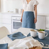 Explore our diverse range of styles, from classic neutrals to vibrant hues, and discover the apron that complements your personal taste and kitchen decor.