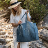 Ocean blue linen tote bags designed and made for long, comfortable and sustainable use. Whether you're going to the beach, planning a visit to the market, or taking your baked cake to friends, our linen bag is always perfect for you.