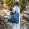 Ocean blue linen tote bags designed and made for long, comfortable and sustainable use. Whether you're going to the beach, planning a visit to the market, or taking your baked cake to friends, our linen bag is always perfect for you.