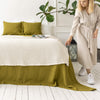 The olive green linen bedspread has been carefully designed to suit a wide range of interior styles and to blend perfectly in both classic and contemporary home spaces.Our linen bedspreads are extremely versatile, fitting into a wide range of interiors and complementing them perfectly, adding new colours and emotions.