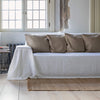 Choosing optical white colour for your couch cover not only offers protection but also brings a timeless elegance to your home interior.