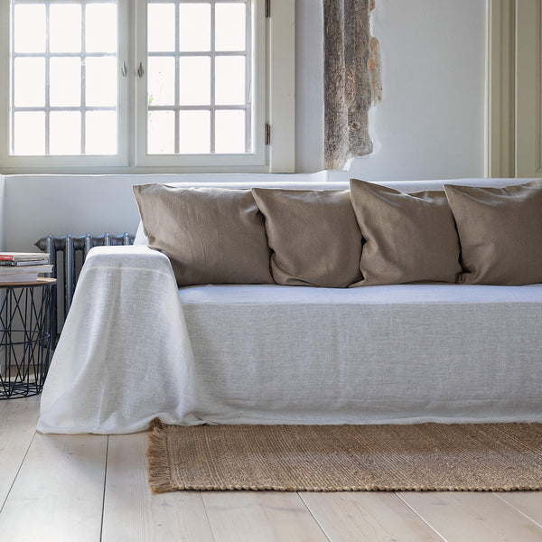 Choosing optical white colour for your couch cover not only offers protection but also brings a timeless elegance to your home interior.