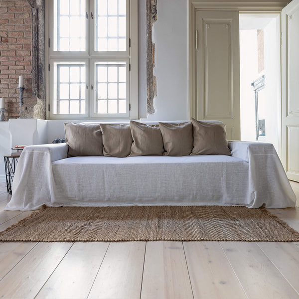 Choosing optical white colour for your couch cover not only offers protection but also brings a timeless elegance to your home interior.