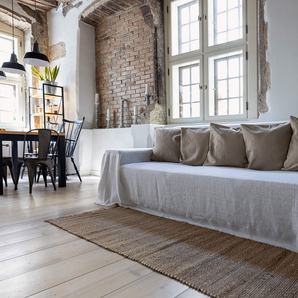 Choosing optical white colour for your couch cover not only offers protection but also brings a timeless elegance to your home interior.