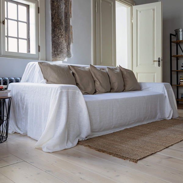Choosing optical white colour for your couch cover not only offers protection but also brings a timeless elegance to your home interior.