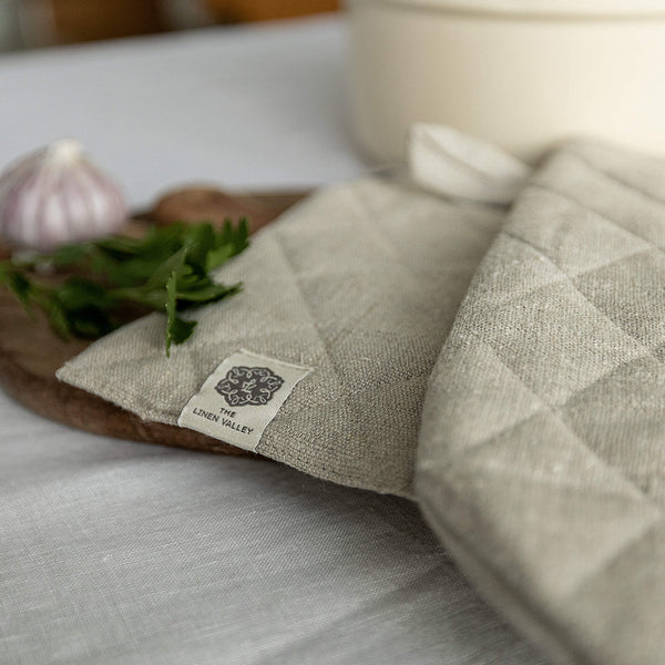 Crafted with care, these rustic unbleached linen oven mitten sets are the perfect companions for your culinary adventures.