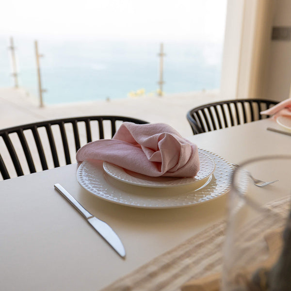 Introducing our quartz rose linen napkins set, designed to elevate your dining experience with a touch of warmth and charm. Crafted with care, these napkins are the perfect companions for your culinary adventures.