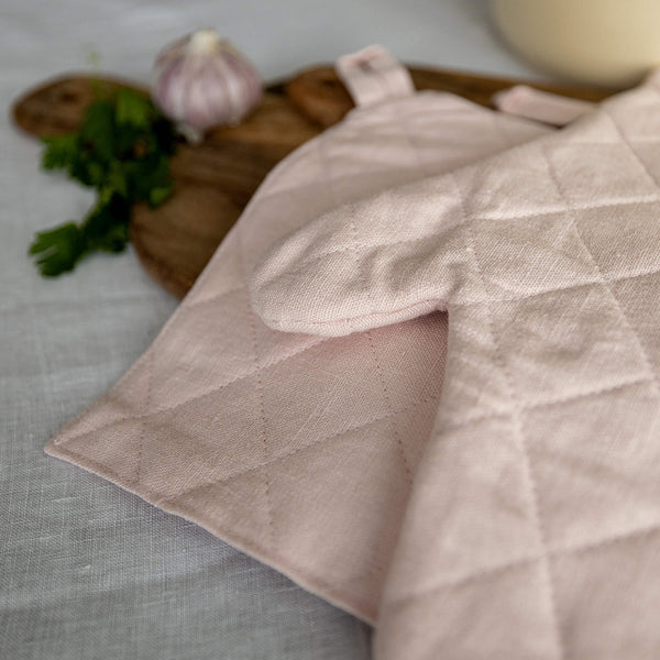 Crafted with care, these quartz rose linen oven mitten sets are the perfect companions for your culinary adventures.