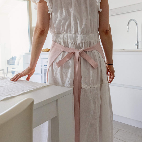 Explore our diverse range of styles, from classic neutrals to vibrant hues, and discover the apron that complements your personal taste and kitchen decor.