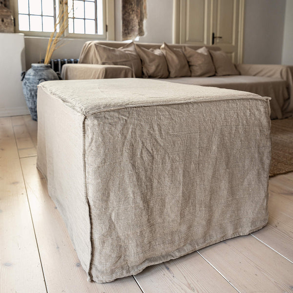 ntroducing our new unbleached natural linen ottoman cover – the ultimate solution for giving your ottoman a fresh look and upgrading your interior effortlessly. Revive your living space with our linen ottoman cover today.