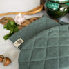 Crafted with care, these teal blue linen oven mitten sets are the perfect companions for your culinary adventures.