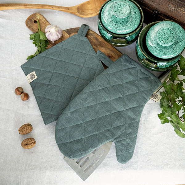 Crafted with care, these teal blue linen oven mitten sets are the perfect companions for your culinary adventures.