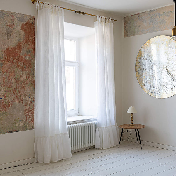 Our optical white linen curtains with ruffles are designed and made to give your home unique and timeless charm. Linen curtains would complement interiors from minimalistic, Scandinavian or modern to Mediterranean or classical style.