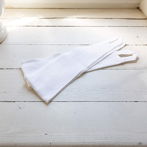 Our optical white linen curtain tie-back the perfect solution to keeping your curtains looking neat and stylish.