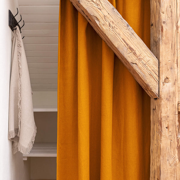 Our tie top amber yellow linen curtains are designed and made to give your home unique and timeless charm. Linen curtains would complement interiors from minimalistic, Scandinavian or modern to Mediterranean or classical style.