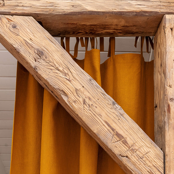 Our tie top amber yellow linen curtains are designed and made to give your home unique and timeless charm. Linen curtains would complement interiors from minimalistic, Scandinavian or modern to Mediterranean or classical style.