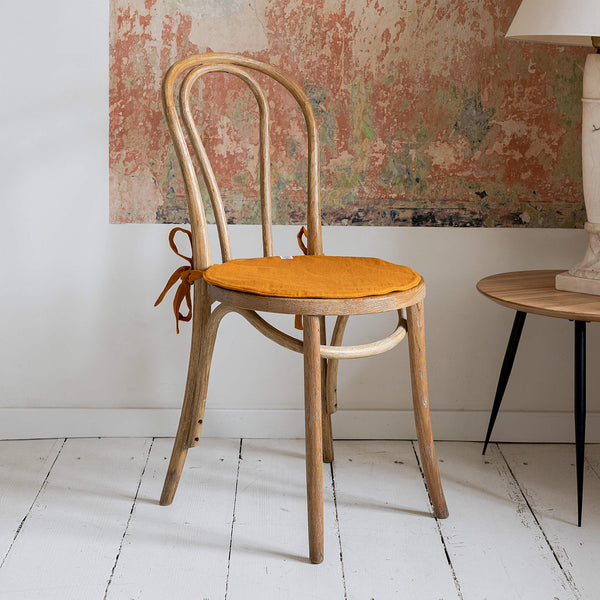 Our amber yellow linen chair slipcovers offer both practicality and aesthetic appeal. The covers will protect dining chairs from spills and stains, also enhance the visual appeal of your space with their timeless natural style. Slipcovers will simply change your chairs' appearance and provide an elegant solution.