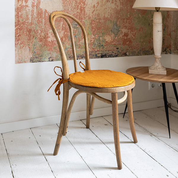 Our amber yellow linen chair slipcovers offer both practicality and aesthetic appeal. The covers will protect dining chairs from spills and stains, also enhance the visual appeal of your space with their timeless natural style. Slipcovers will simply change your chairs' appearance and provide an elegant solution.