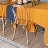 Our amber yellow linen ruffled chair slipcovers offer both practicality and aesthetic appeal. The covers will protect dining chairs from spills and stains, also enhance the visual appeal of your space with their timeless natural style. Slipcovers will simply change your chairs appearance and provide an elegant solution.